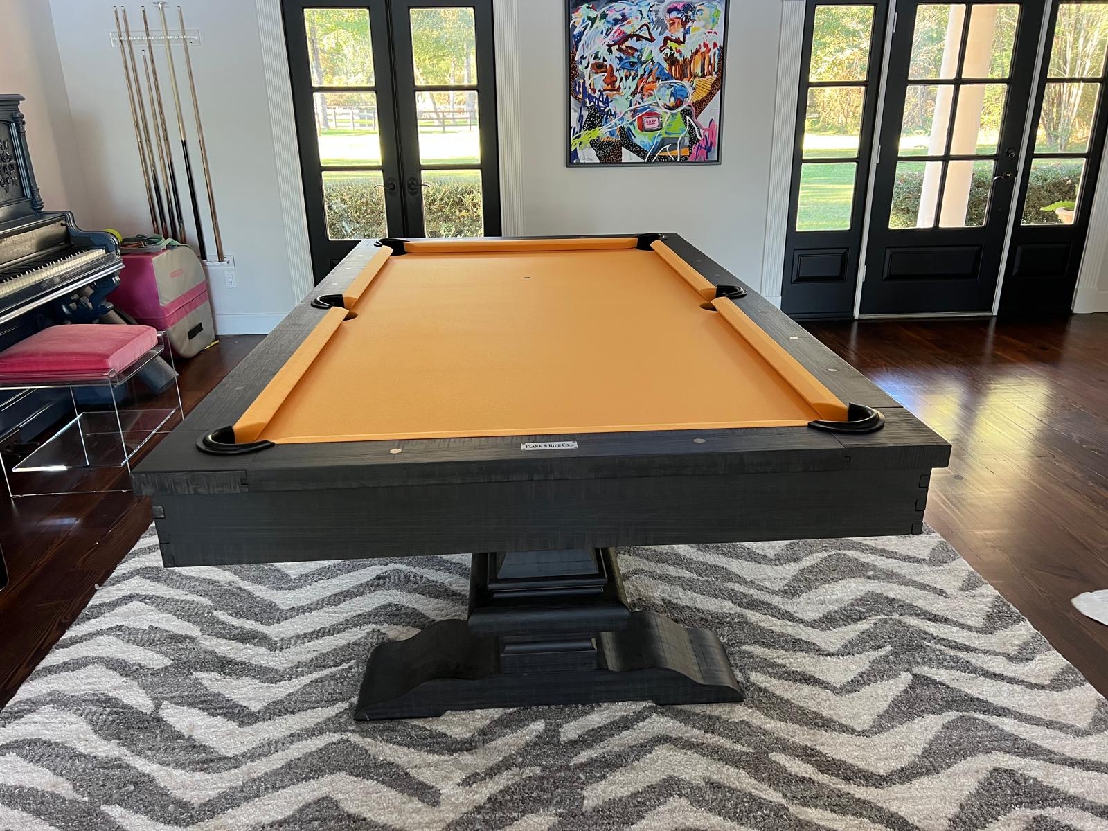 Living room pool table with navy felt