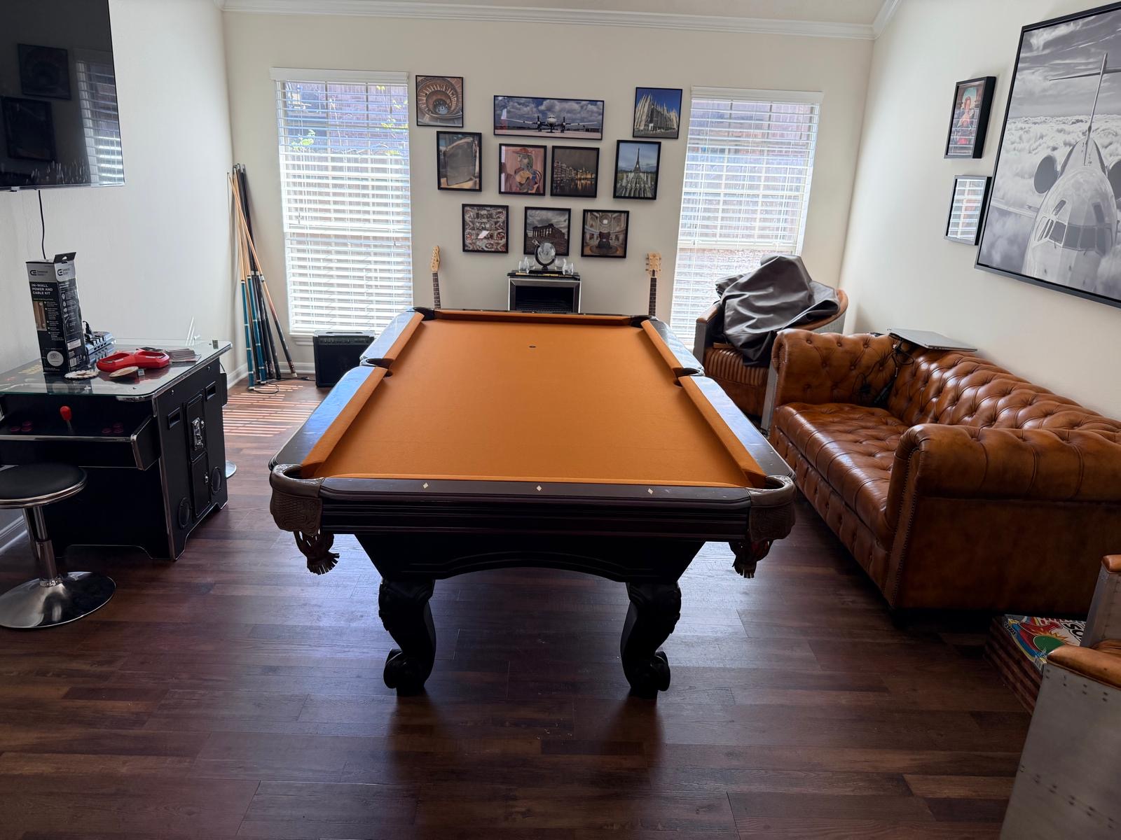 Pool table in game room before removal
