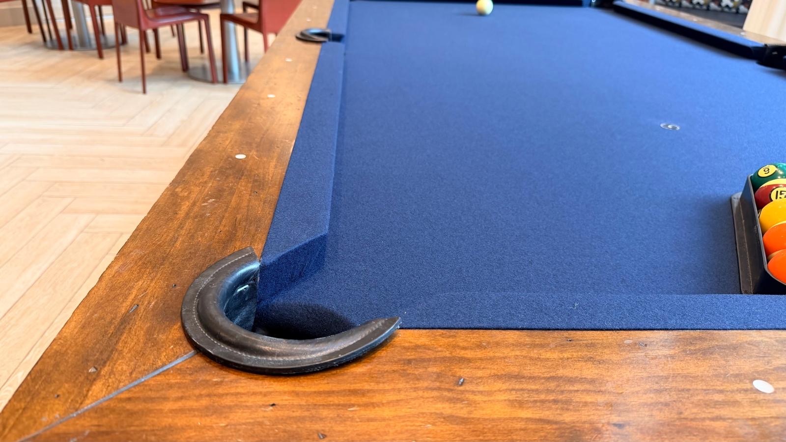 Pool table refelting closeup